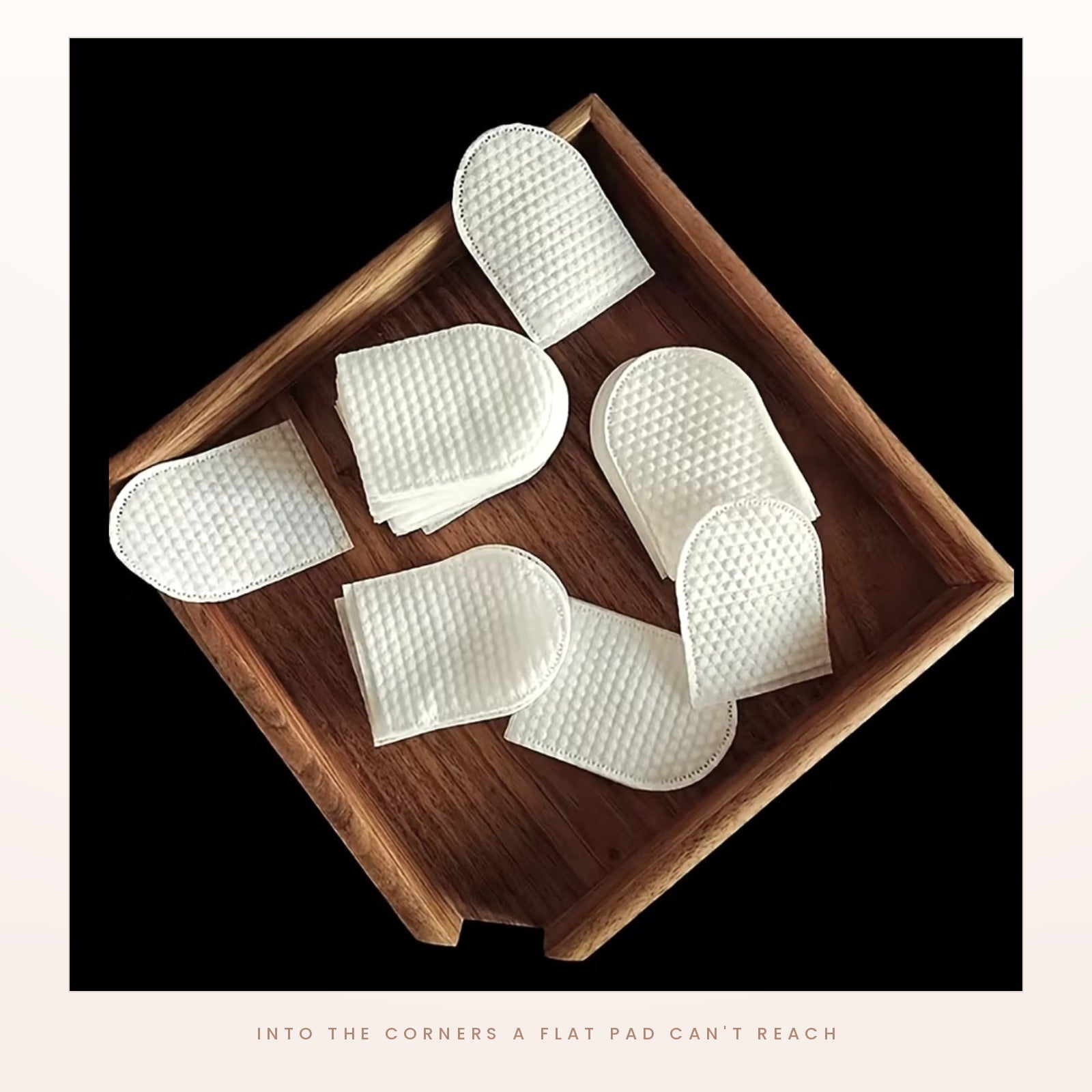 A cleansing mitt on a finger, lifting make-up